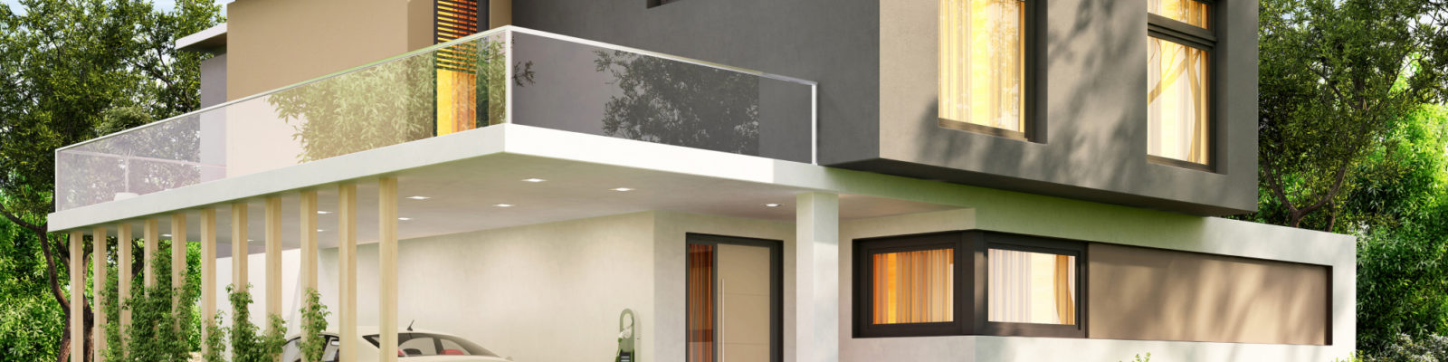 Photo of a modern house with an EV charger in the garage.